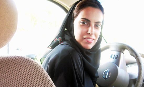 A Saudi Arabian woman defies the ban on driving via the women2drive campaign