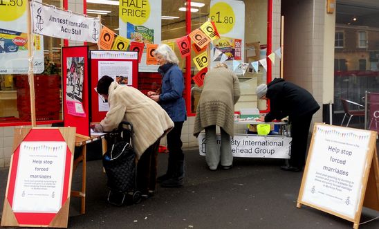 Action stall in Minehead's main shopping street Action stall in Minehead's main shopping street