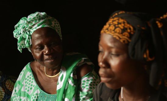 Women's rights activist Bibata Ouedraogo speaks with Abibou Sanga at counselling Women's rights activist Bibata Ouedraogo speaks with Abibou Sanga at counselling