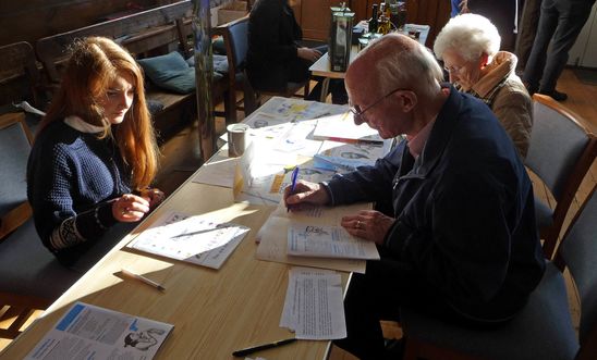 Signing cards at Write for Rights morning Signing cards at Write for Rights morning