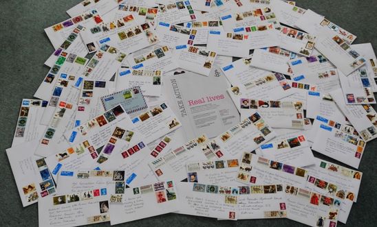 Piles of letters written on behalf on individuals at risk