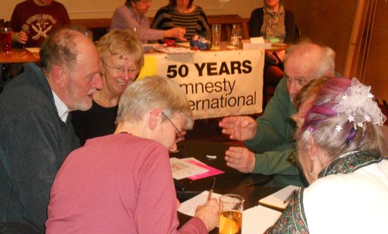 The 2014 Amnesty quiz showing the quiz organisers and one of the teams The 2014 Amnesty quiz showing the quiz organisers and one of the teams