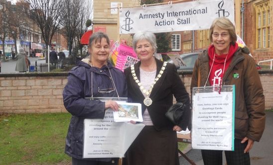 Members with the mayor for Write for Rights