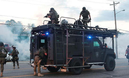 Tactical police in Ferguson, Missouri Tactical police in Ferguson, Missouri