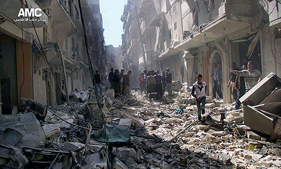 Syrians inspect the rubble of destroyed buildings Syrians inspect the rubble of destroyed buildings