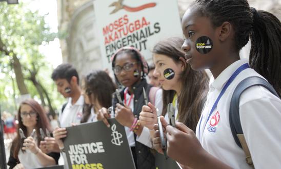 Young activists standing outside the Nigeria High Commission in London Young activists standing outside the Nigeria High Commission in London