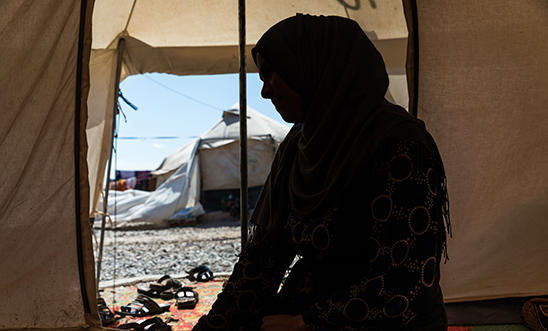 Silhouette of woman in displacement camp in Iraq for perceived ties to Islamic State Silhouette of woman in displacement camp in Iraq for perceived ties to Islamic State