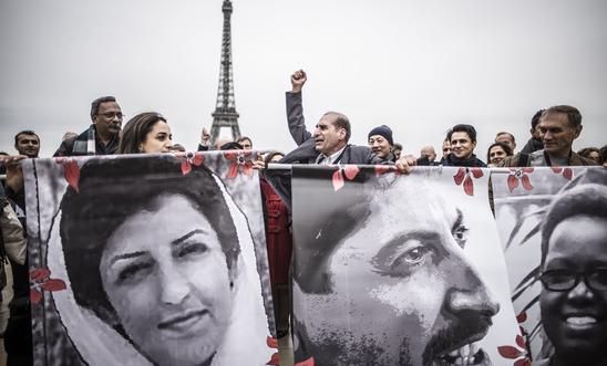 Activists gather outside the Palais de Chaillot for the closing ceremony of the Human Rights Defenders World Summit 2018 Activists gather outside the Palais de Chaillot for the closing ceremony of the Human Rights Defenders World Summit 2018