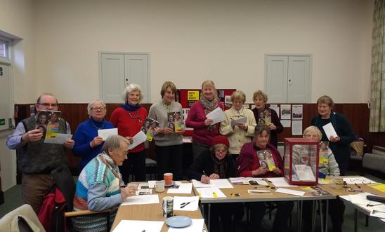 Letter writers holding up their letters Letter writers holding up their letters