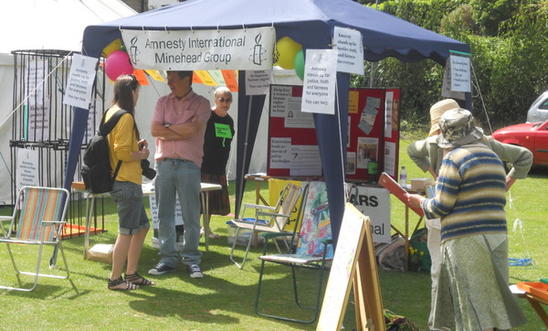 Stall at fete with Amnesty information, letters and petition Stall at fete with Amnesty information, letters and petition