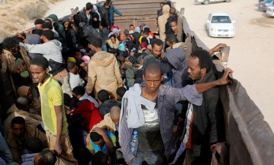 African migrants are transferred to a detention centre African migrants are transferred to a detention centre