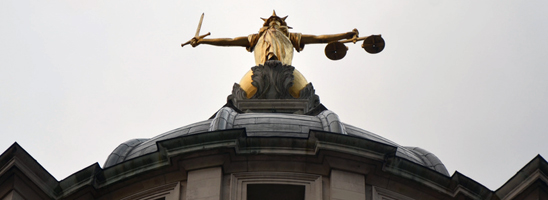 Justice statue on the Old Bailey in London, by bensutherland on Flickr, used under Creative Commons license