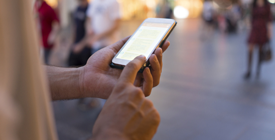 Mobile phone in street