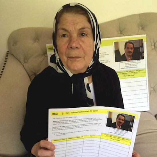 Ezat Taheri campaigning for her son