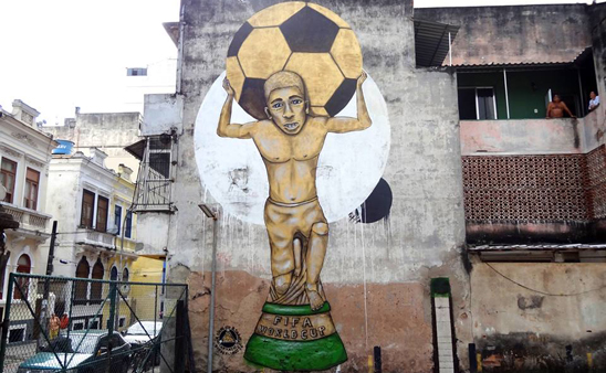 Graffiti in Rio de Janeiro by Captain Borderline, depicting Rafael Braga Vieira as the World Cup trophy